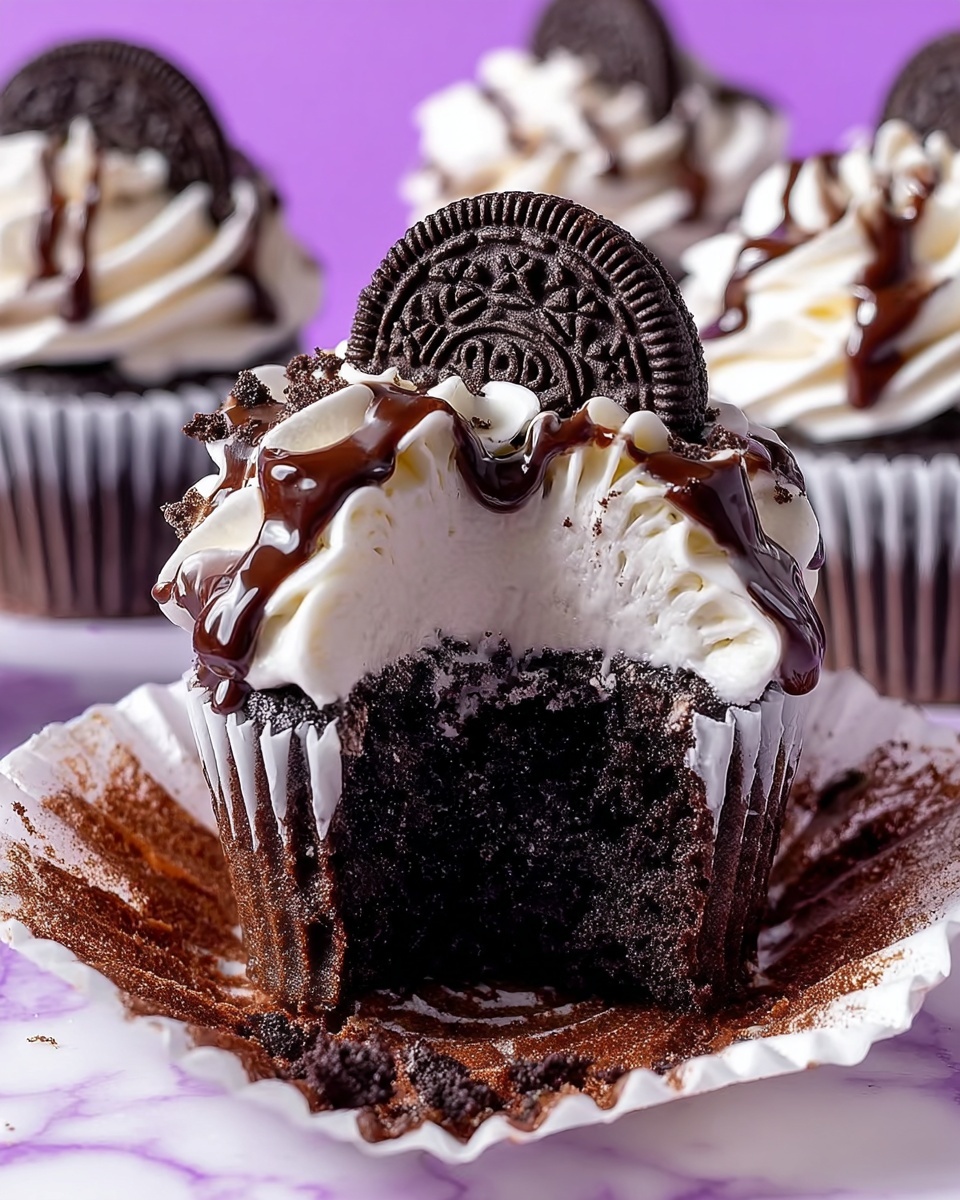 Cookies and Cream Cupcakes with Oreo Frosting and Chocolate Drizzle Recipe - Recipe Image