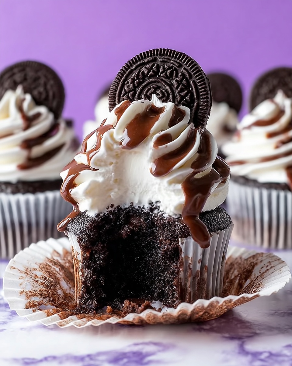 Cookies and Cream Cupcakes with Oreo Frosting and Chocolate Drizzle Recipe - Recipe Image