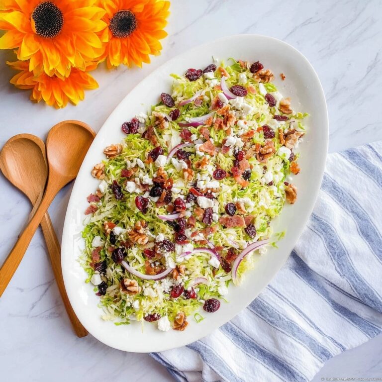 Shaved Brussels Sprout Salad with Bacon, Cranberries, and Goat Cheese Recipe